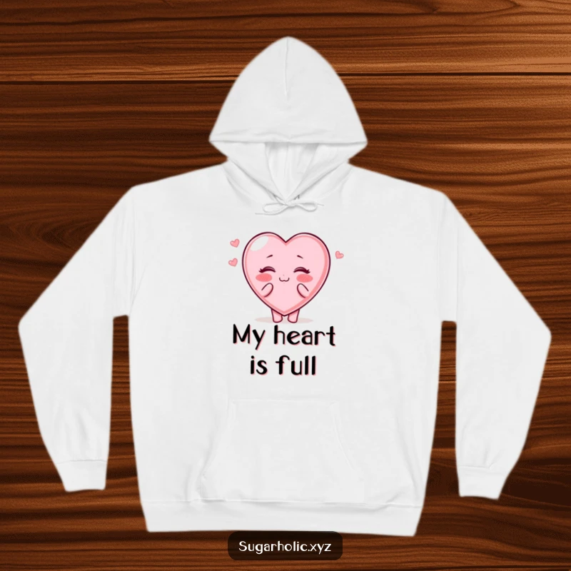 Funny Hoodie: A candy heart character with rosy cheeks blows kisses cheerfully, perfect for cozy hugs.