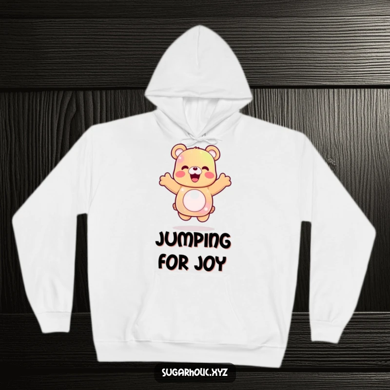 Funny gummy bear hoodie featuring a delighted character in a celebratory jump, perfect for staying cozy and cheerful.