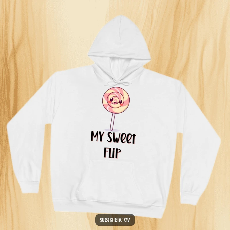 Funny giggling lollipop with a swirl pattern doing a cartwheel on a hoodie, offering a cozy and playful vibe.